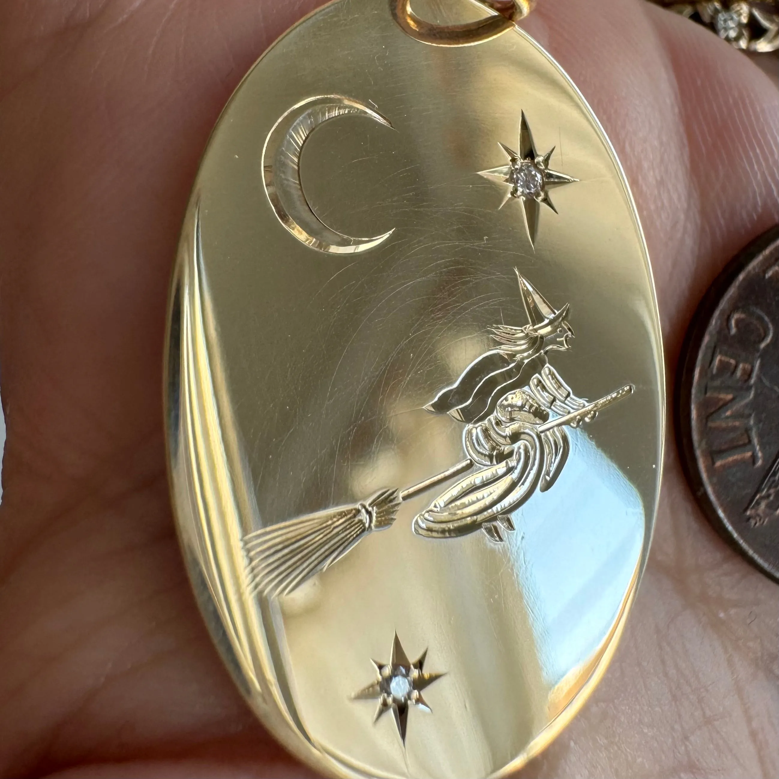 reimagined V I N T A G E // the best witch / 14k   diamonds witch flying on a broom in the night sky / an oval pendant